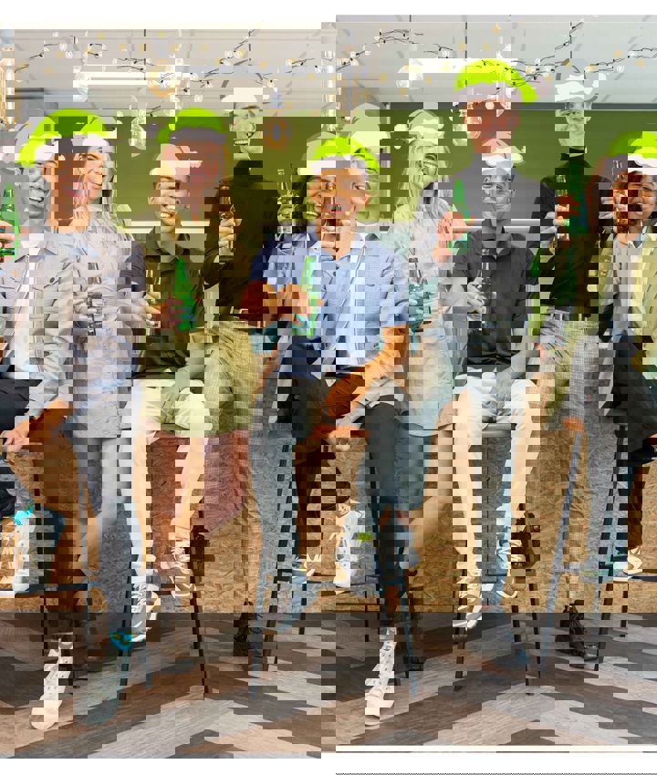 Groepsfoto met SUSA kerstmutsen